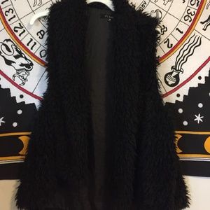 Black furry vest